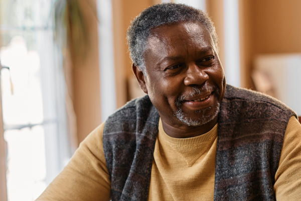 two men talking in a group home for people with mental illness