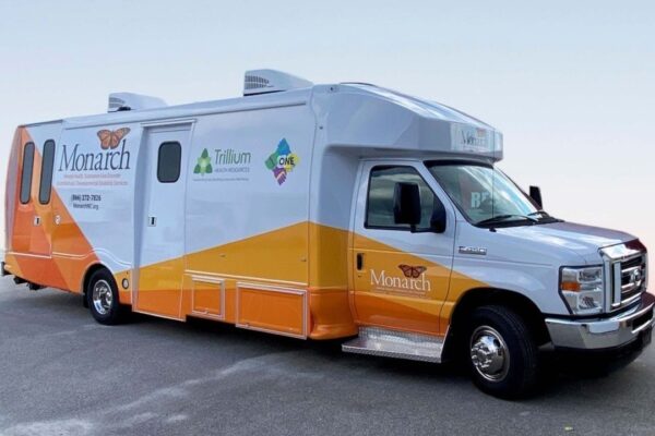 Monarch’s Mobile Integrated Care Clinic providing mental health and substance use disorder services to individuals in need. The mobile unit is equipped with professional staff and resources to support the community.