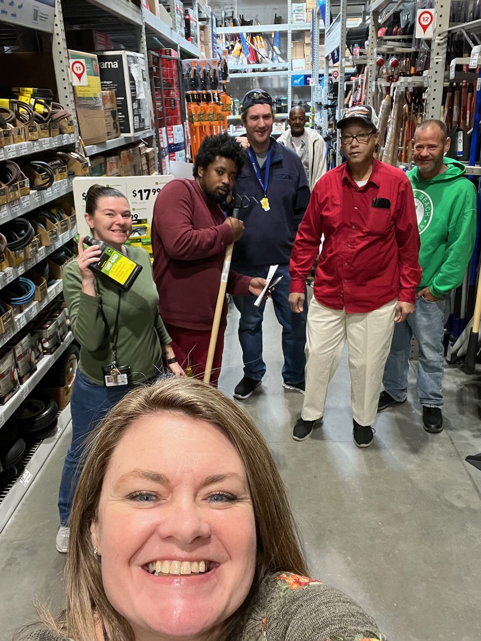 Richmond PSR Behavioral Specialist Chrystal Weatherly takes a selfie while Amanda Kempen, left, and program attendees visit a local retailer to purchase gardening supplies thanks to a grant from the NC Cooperative Extension.
